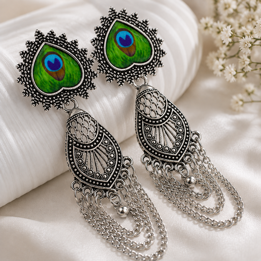 Close-up details of oxidised silver earrings