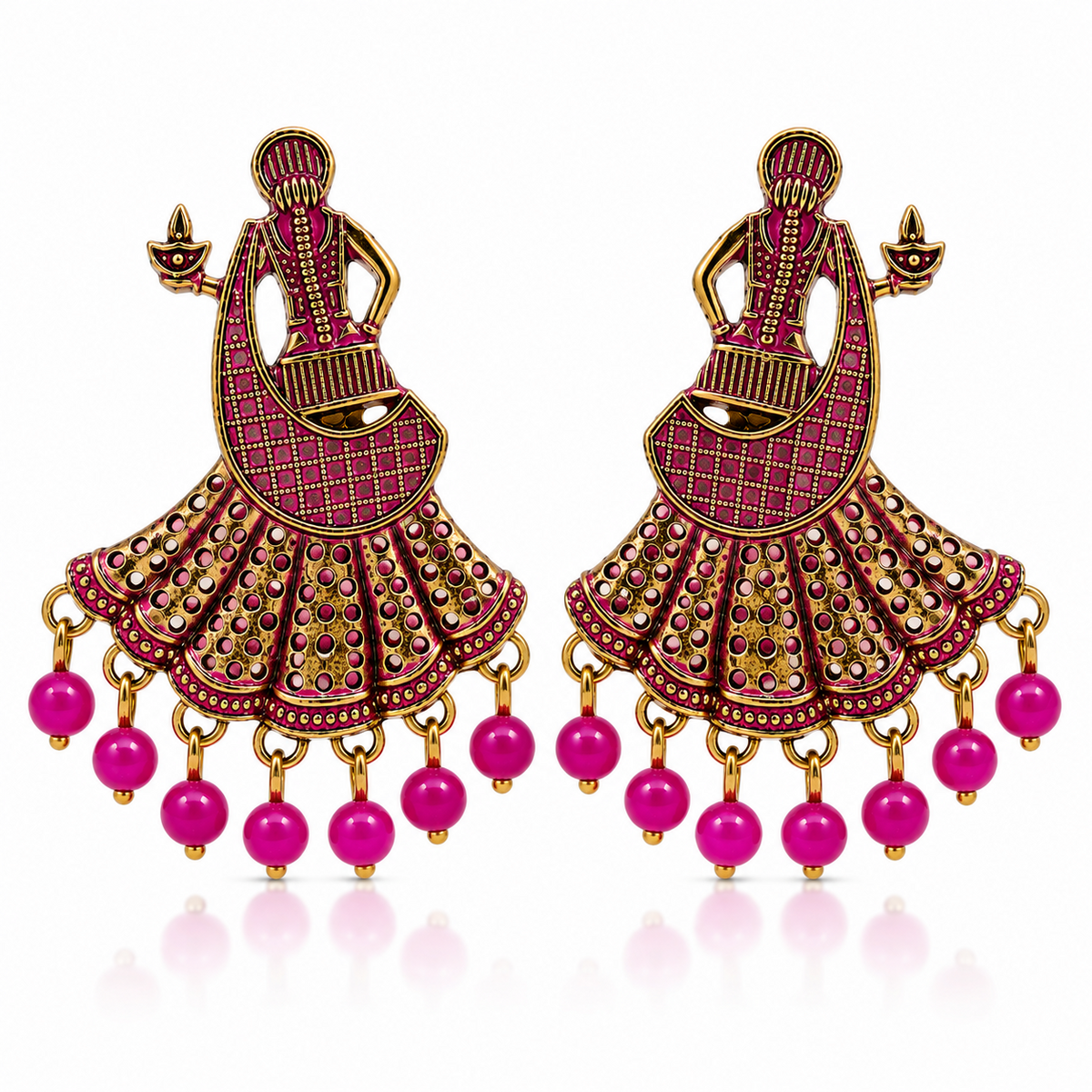 Gold tone pink festive dangler earrings with dancing figure motif and bead fringe, pair