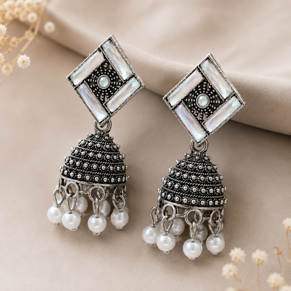 Closeup of JH-72 jhumka earrings with pearl drops
