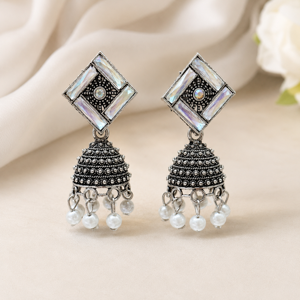 JH-72 silver oxidised geometric jhumka earrings on neutral backdrop