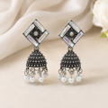 JH-72 silver oxidised geometric jhumka earrings on neutral backdrop