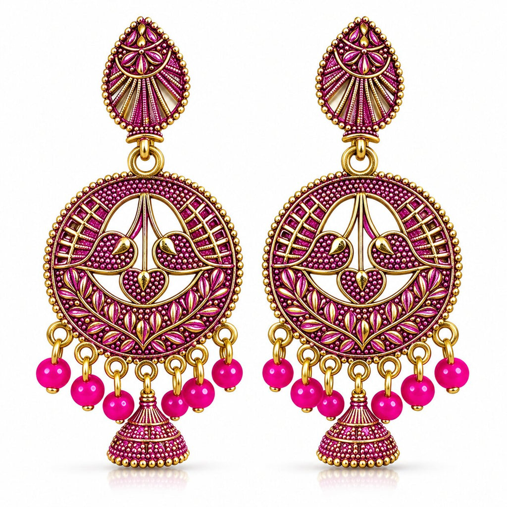 Pair of pink and gold round jhumka drop earrings on white background