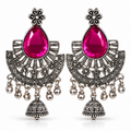 Oxidised silver tone pink stone chandbali jhumka earrings on white background