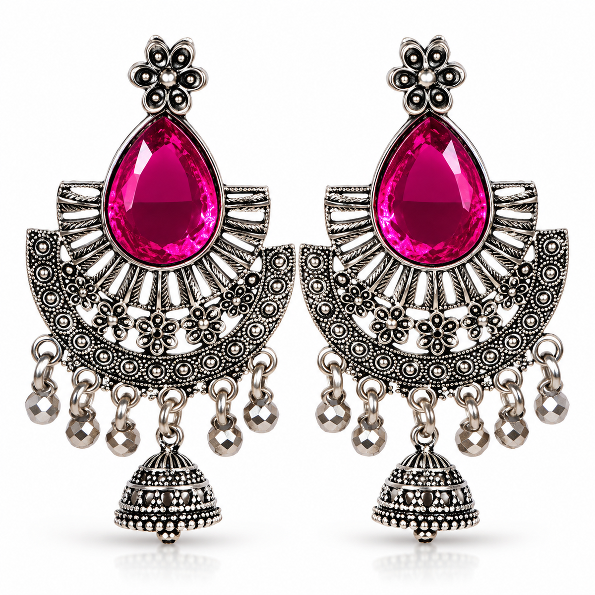 Oxidised silver tone pink stone chandbali jhumka earrings on white background