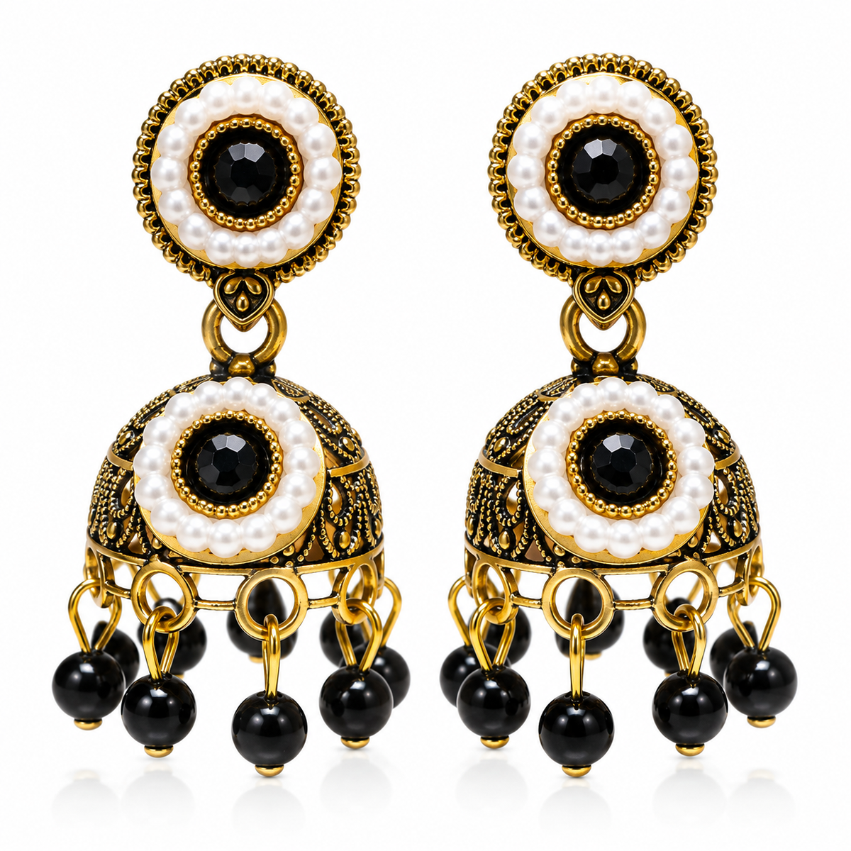 Black stone and pearl-style antique-gold jhumka earrings against white background