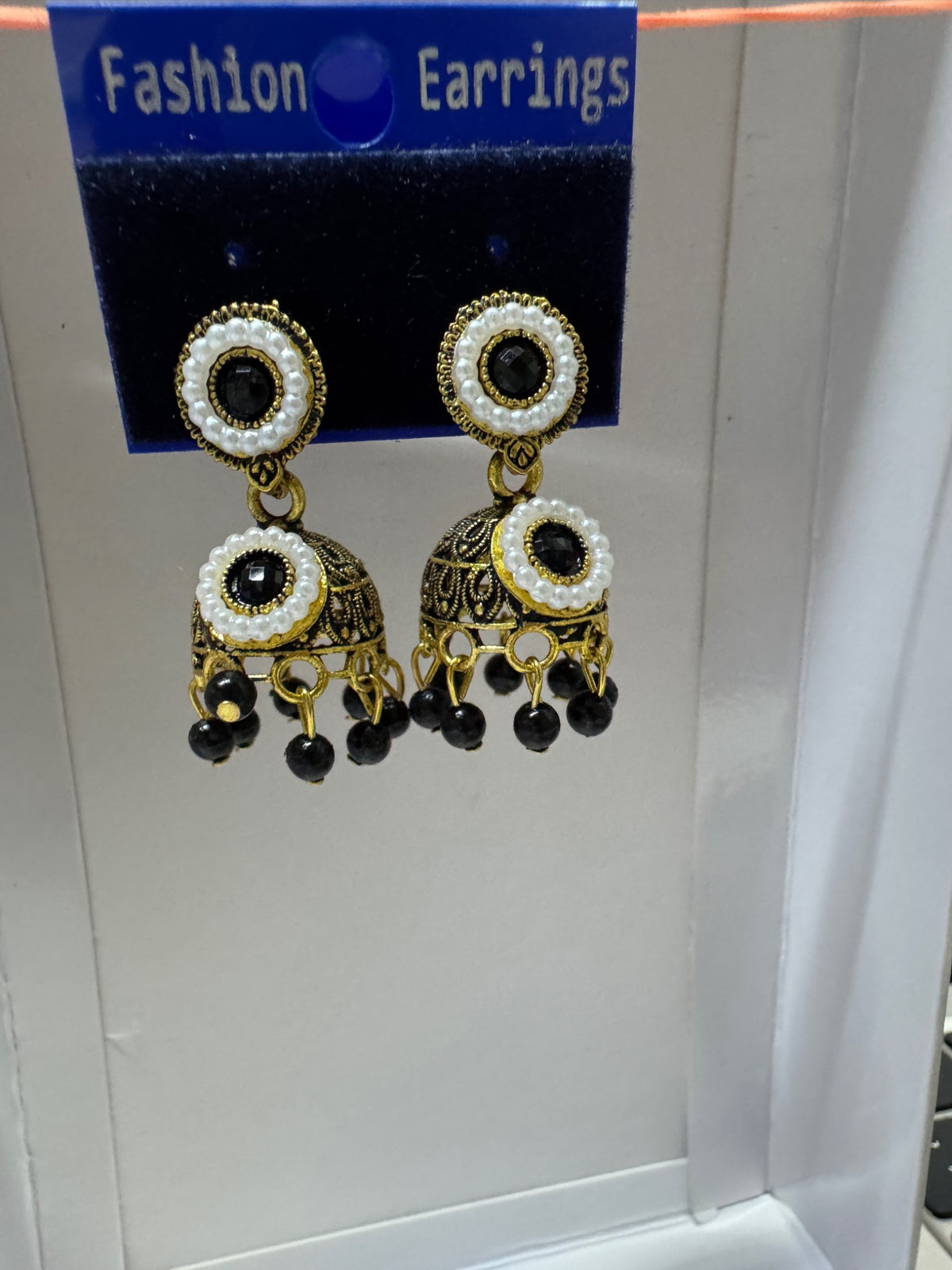 Actual black and white pearl-style jhumka earrings