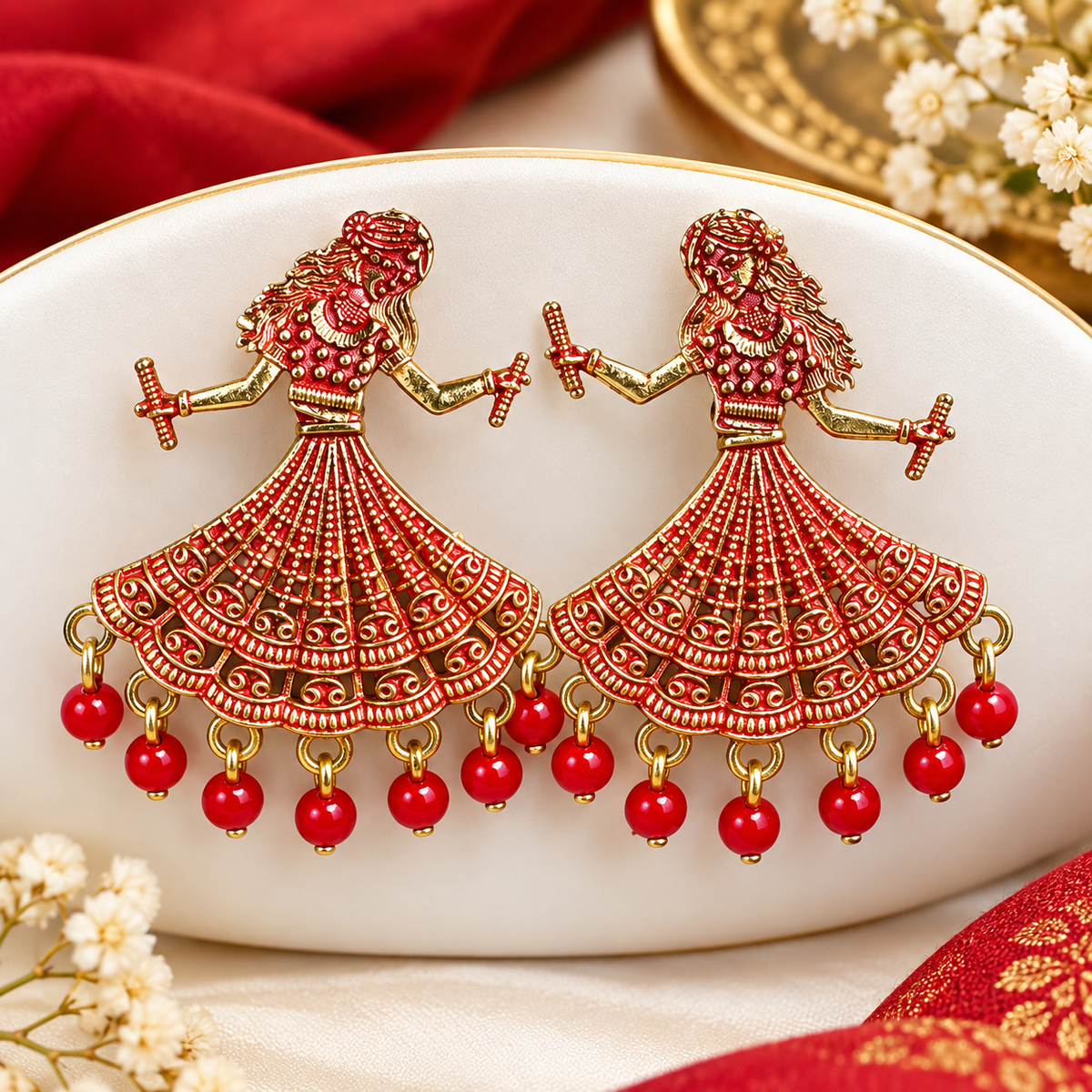 Red and gold dancing doll dandiya earrings